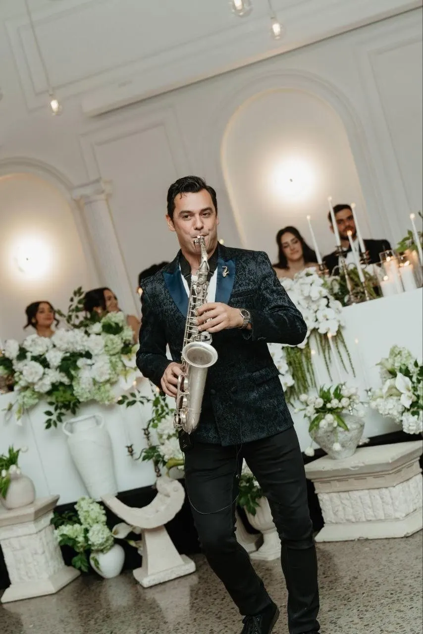 Orget Sax playing solo saxophone live at a wedding